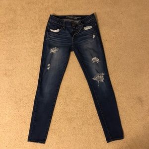 Dark wash ripped denim jeans